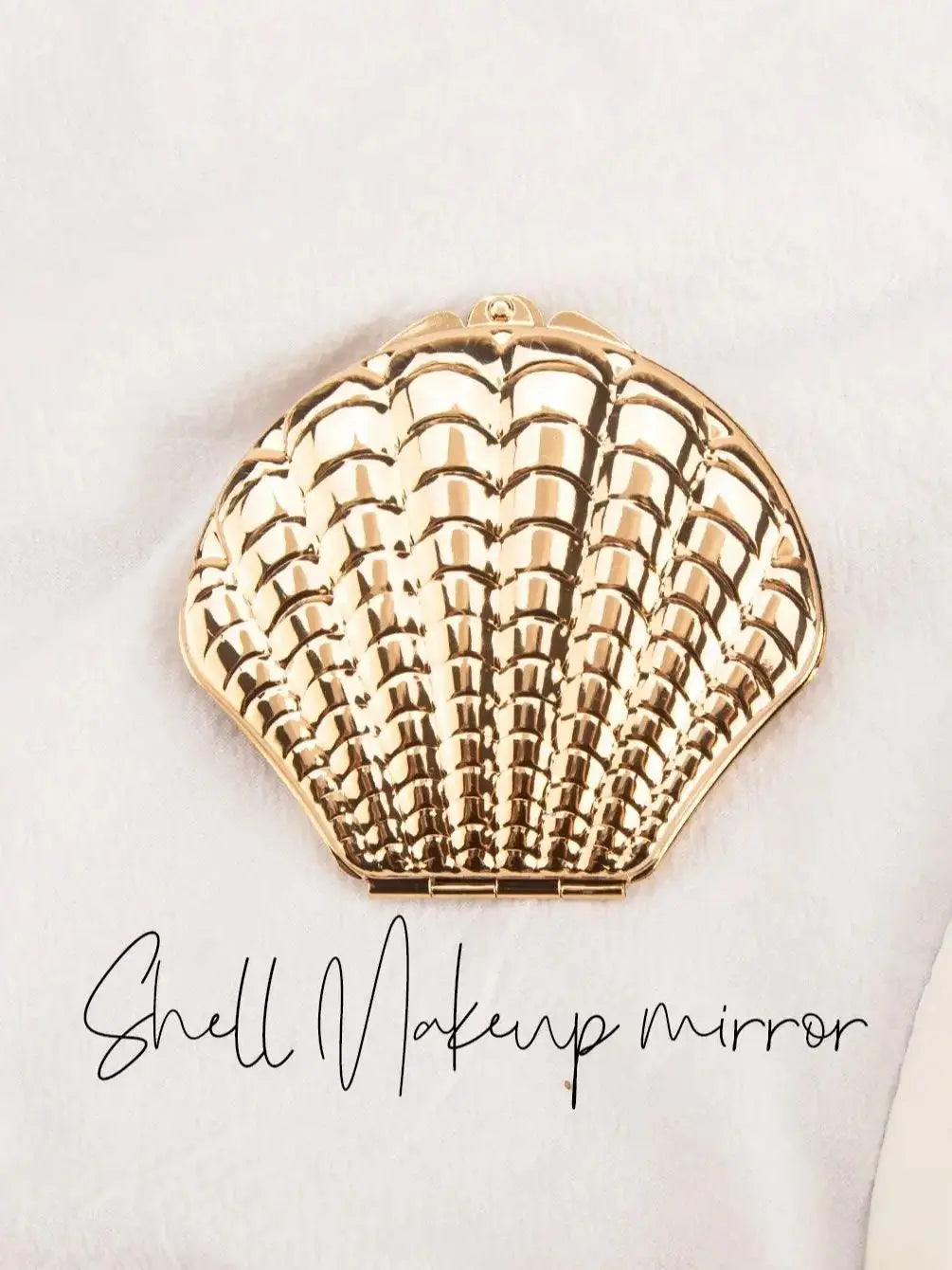 Miroir coquillage doré