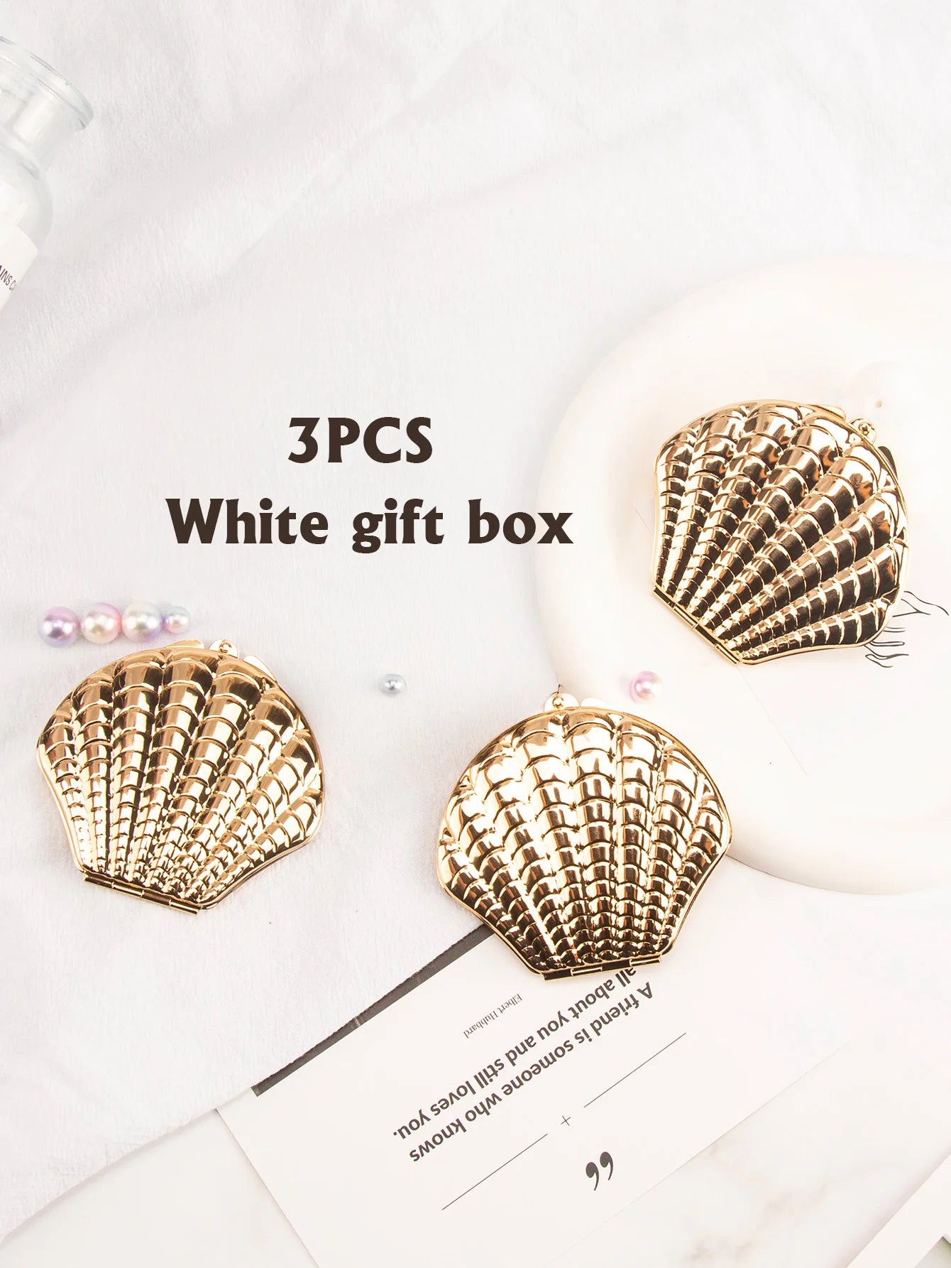 Miroir coquillage doré